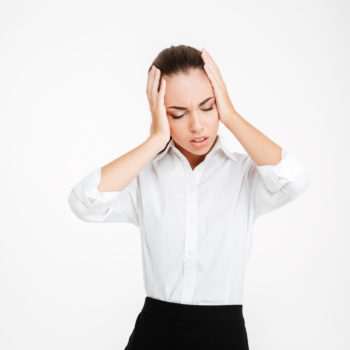 graphicstock-portrait-of-a-depressed-tired-businesswoman-standing-over-white-background_Hu7H5xpr3x